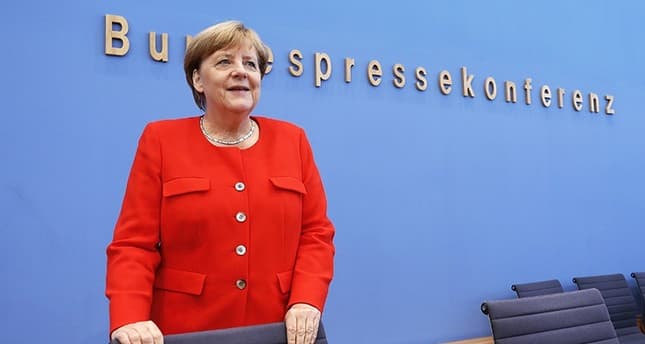Merkel reiteró en campaña que abrir las puertas a los refugiados en 2015 fue una «excepción»